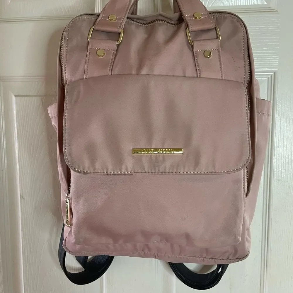 Steve Madden Nylon blush pink backpack with black embroidery back straps.